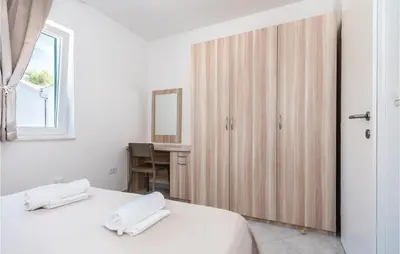 Krevet ili kreveti u jedinici u objektu Apartment Grebastica Lxxxviii