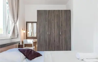 Krevet ili kreveti u jedinici u objektu Apartment Grebastica Lxxxviii