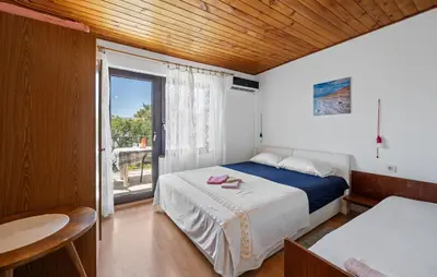 Krevet ili kreveti u jedinici u objektu 3 Bedroom Cozy Apartment In Vodice