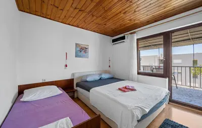 Krevet ili kreveti u jedinici u objektu 3 Bedroom Cozy Apartment In Vodice