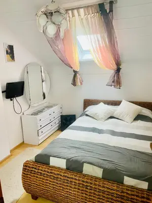 Krevet ili kreveti u jedinici u objektu Ferienwohnung mit traumhafter Aussicht
