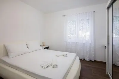 Krevet ili kreveti u jedinici u objektu Villa Laura Apartments