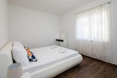 Krevet ili kreveti u jedinici u objektu Villa Laura Apartments