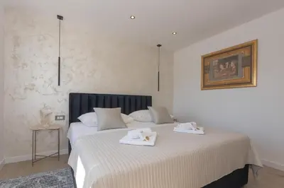 Krevet ili kreveti u jedinici u objektu Apartment Omnia