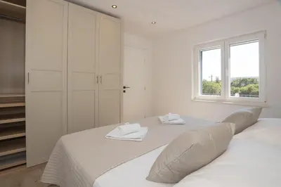 Krevet ili kreveti u jedinici u objektu Apartment Omnia
