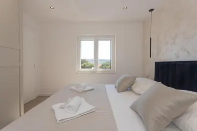 Krevet ili kreveti u jedinici u objektu Apartment Omnia