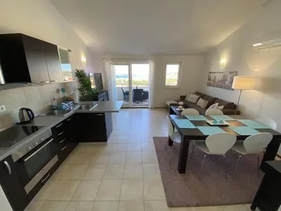 Kuhinja ili čajna kuhinja u objektu Apartment Bumbar Sunset