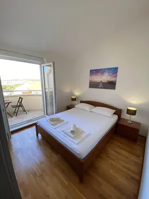 Krevet ili kreveti u jedinici u objektu Apartment Bumbar Sunset