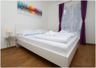 Krevet ili kreveti u jedinici u objektu Apartments Nika
