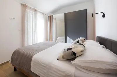 Krevet ili kreveti u jedinici u objektu Apartments Opat