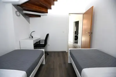 Krevet ili kreveti u jedinici u objektu D R Apartments