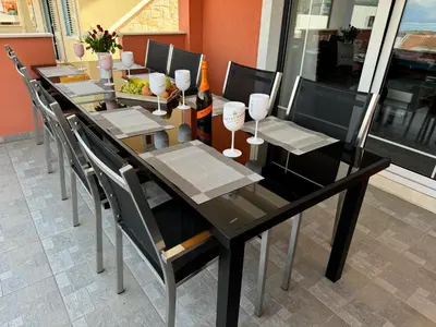 TV i/ili zabavni centar u objektu Ferienhaus Bilice - Pool beheizt - Fitness - Relax