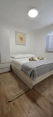 Krevet ili kreveti u jedinici u objektu Apartmani Deniza 4 guests