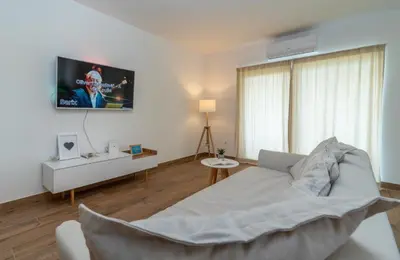 TV i/ili zabavni centar u objektu Sea View House