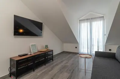 TV i/ili zabavni centar u objektu Sea View House