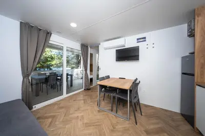 TV i/ili zabavni centar u objektu Mobile homes Jezera Lovišća Premium