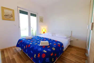 Krevet ili kreveti u jedinici u objektu House with garden and Barbecue grill in Murter
