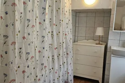 Kupaonica u objektu Stone Three bedroom house with rooftop terrace