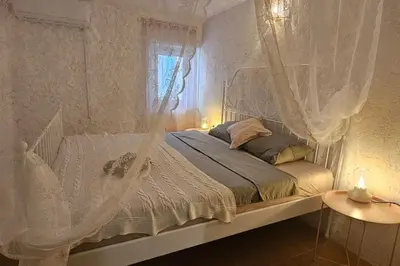 Krevet ili kreveti u jedinici u objektu Stone Three bedroom house with rooftop terrace