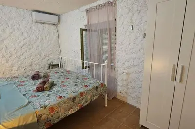 Krevet ili kreveti u jedinici u objektu Stone Three bedroom house with rooftop terrace