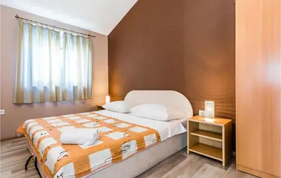 Krevet ili kreveti u jedinici u objektu Holiday Home Tribunj 430