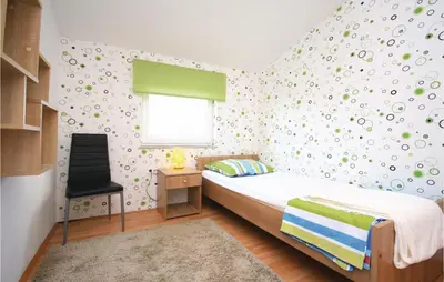 Krevet ili kreveti u jedinici u objektu Holiday Home Drinovci With A Fireplace 444