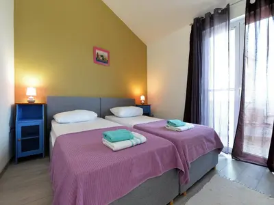 Krevet ili kreveti u jedinici u objektu Apartments Helena - Superior One bedroom apartment with Balcony and Sea View - A2