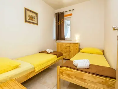 Krevet ili kreveti u jedinici u objektu Holiday Home Marinela - Four Bedroom Holiday Home with Swimming Pool