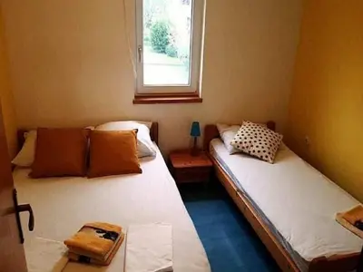 Krevet ili kreveti u jedinici u objektu Apartments Marija - One Bedroom Apartment with Balcony and Sea View uti A2
