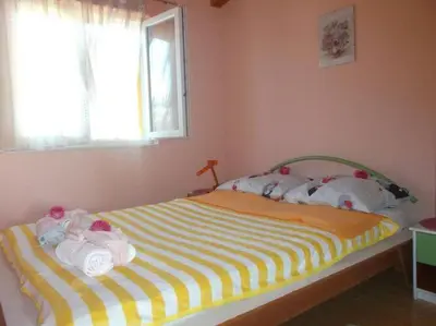 Krevet ili kreveti u jedinici u objektu Apartments Sunce - One Bedroom Apartment with Terrace and Sea View