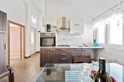 Kuhinja ili čajna kuhinja u objektu Holiday Home Bene