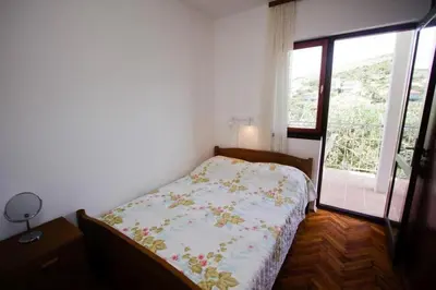 Krevet ili kreveti u jedinici u objektu Apartments by the sea Cove Kalebova Luka, Rogoznica - 23548