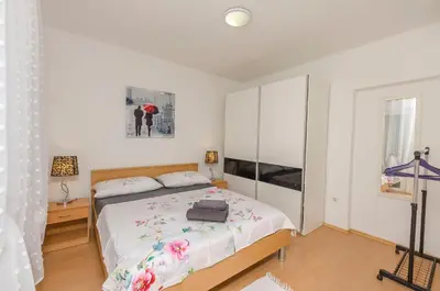 Krevet ili kreveti u jedinici u objektu Apartments Beachfront Srima