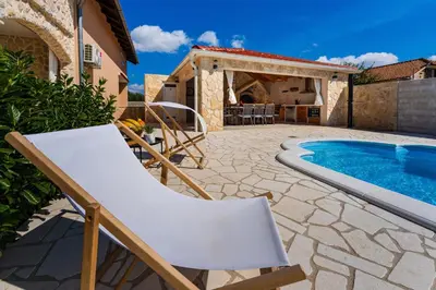 Bazen u objektu MY DALMATIA - Holiday home Briscola with private pool and amazing outside kitchen ili u blizini