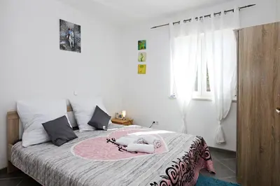 Krevet ili kreveti u jedinici u objektu Family-friendly apartments with swimming pool Stupin Celine, Rogoznica - 23257