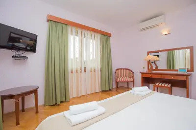 Krevet ili kreveti u jedinici u objektu Rooms Plava Laguna