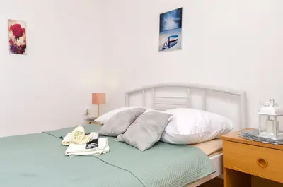Krevet ili kreveti u jedinici u objektu Apartments Sunny Corner