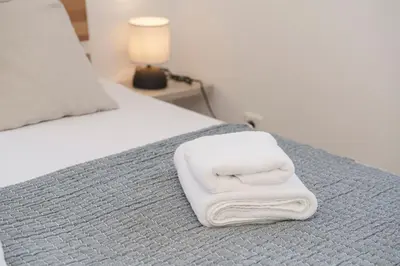 Krevet ili kreveti u jedinici u objektu Villa Mia - Moderne Oase mit Meerblick und Pool