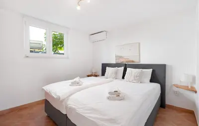 Krevet ili kreveti u jedinici u objektu 2 Bedroom Gorgeous Apartment In Rogoznica