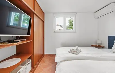 Krevet ili kreveti u jedinici u objektu 2 Bedroom Gorgeous Apartment In Rogoznica