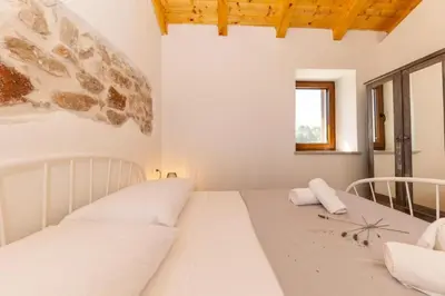 Krevet ili kreveti u jedinici u objektu Stone villa Marita with pool