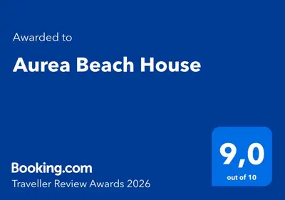 Certifikat, nagrada, logo ili neki drugi dokument izložen u objektu Aurea Beach House