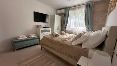 TV i/ili zabavni centar u objektu Villa MM Stankovci with heated pool, sauna, jacuzzi