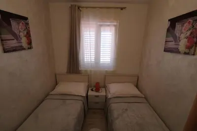 Krevet ili kreveti u jedinici u objektu Apartmani Bilokapić