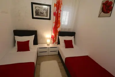 Krevet ili kreveti u jedinici u objektu Apartmani Bilokapić