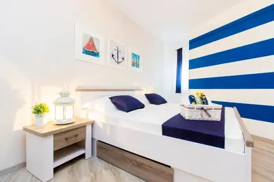 Krevet ili kreveti u jedinici u objektu Aquarius Apartments - Beachside with Heated Pool