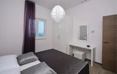 Krevet ili kreveti u jedinici u objektu Nice Apartment In Rogoznica With Sauna