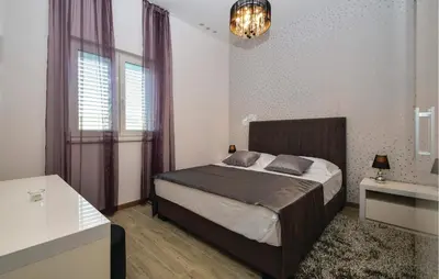 Krevet ili kreveti u jedinici u objektu Amazing Apartment In Rogoznica