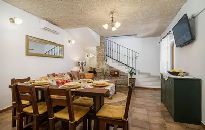 TV i/ili zabavni centar u objektu Holiday Home Marilu with pool