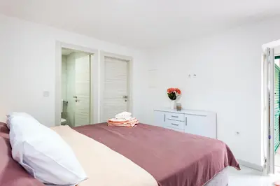 Krevet ili kreveti u jedinici u objektu Apartman Ksenija kat